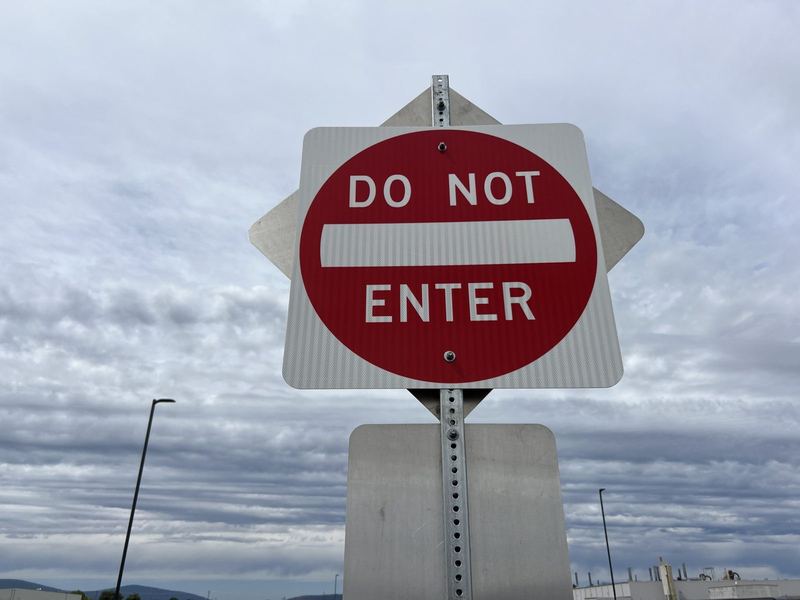 Do Not Enter sign installed at a commercial warehouse lot